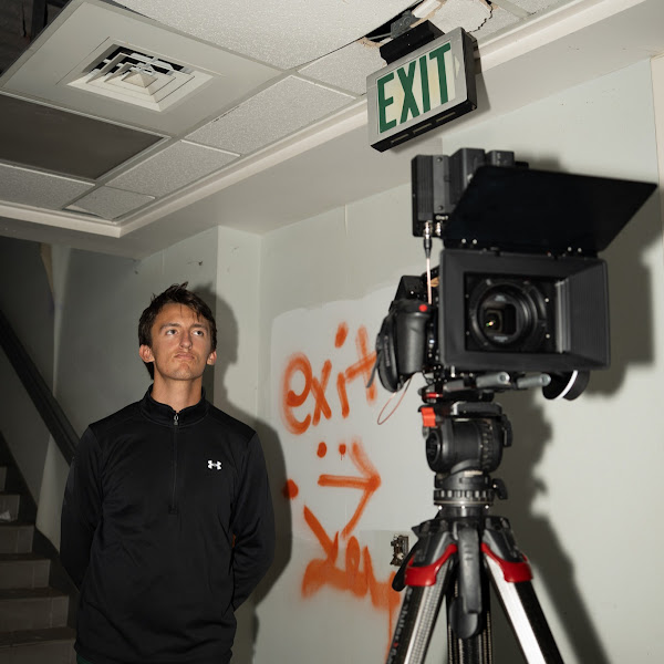 Adam Ampudia with professional camera equipment